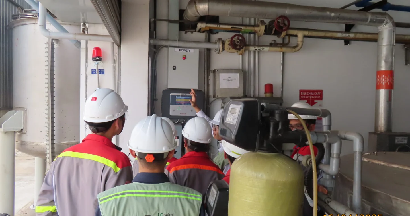CAD engineering team in a plant room